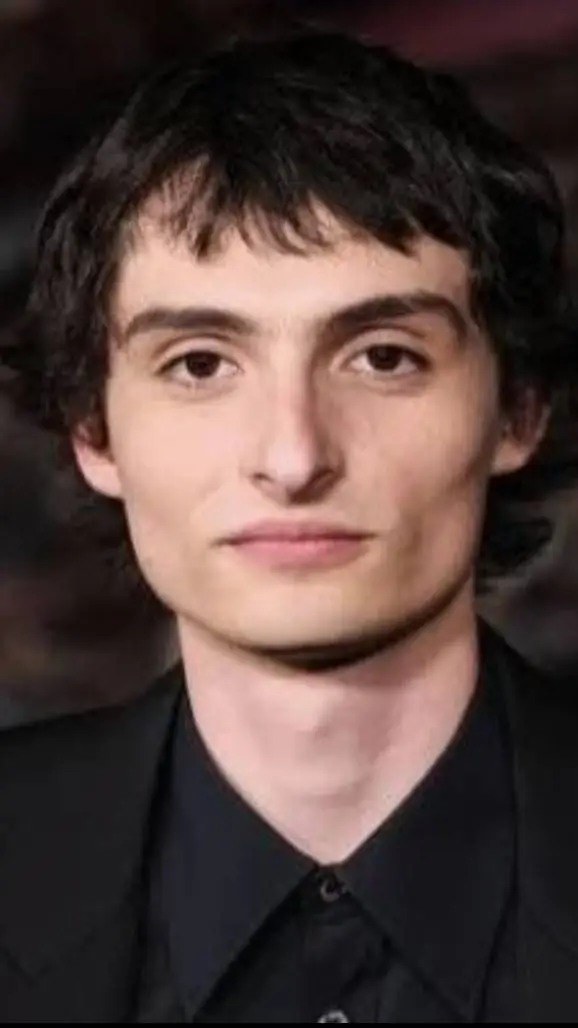 ai character: finn Wolfhard  background