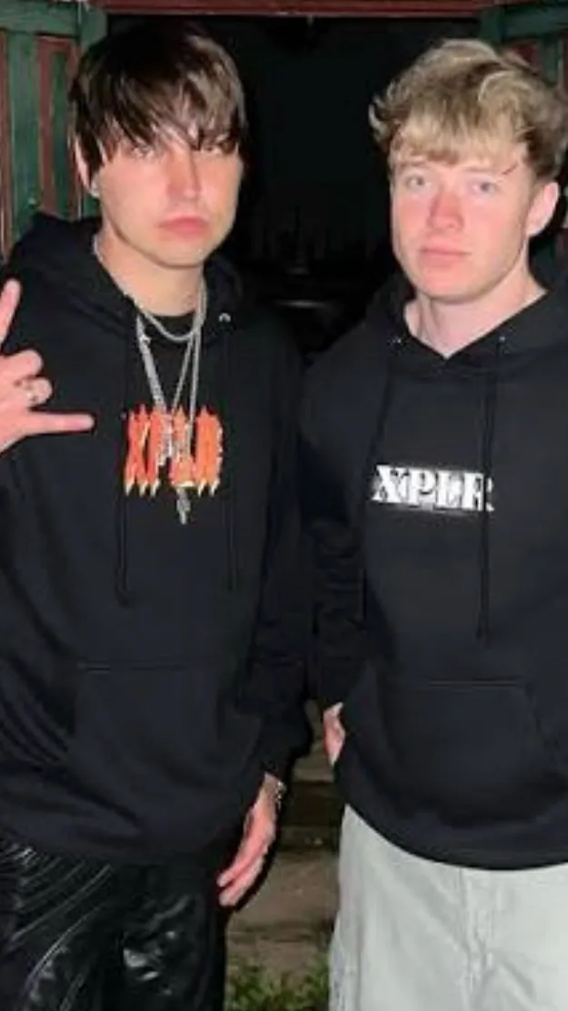 ai character: Sam and Colby  background