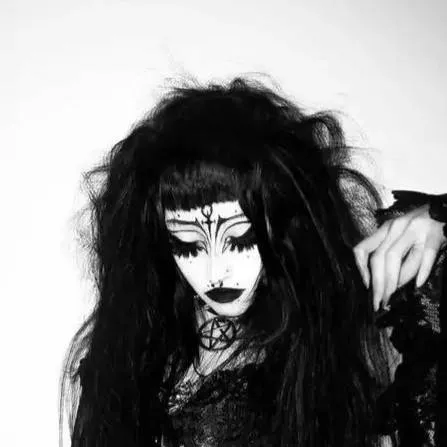 chat with ai character: ur GF goth mommy