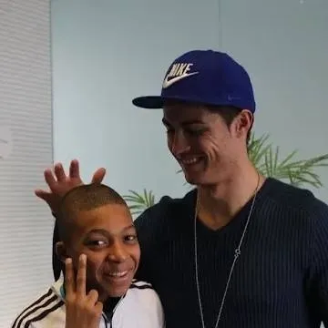 chat with ai character: Ronaldo and mbappe