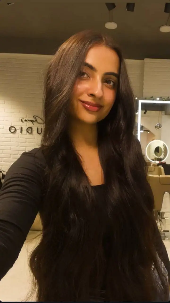 ai character: Simran Kaur background