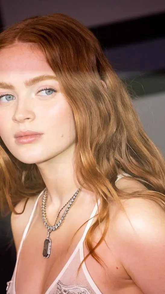 ai character: Sadie sink  background