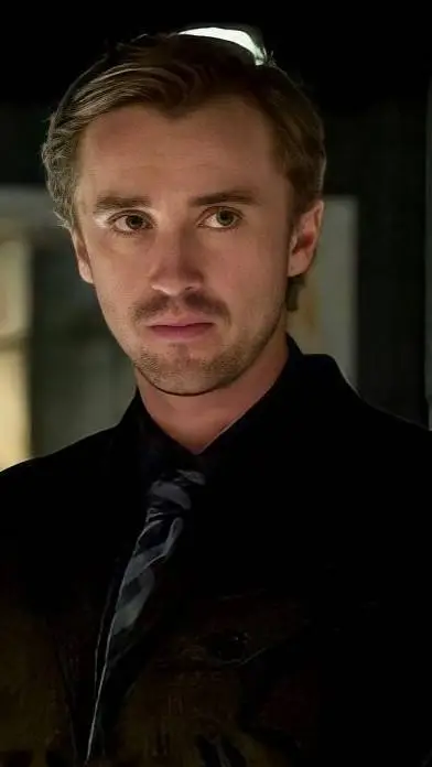 ai character: Tom Felton  background