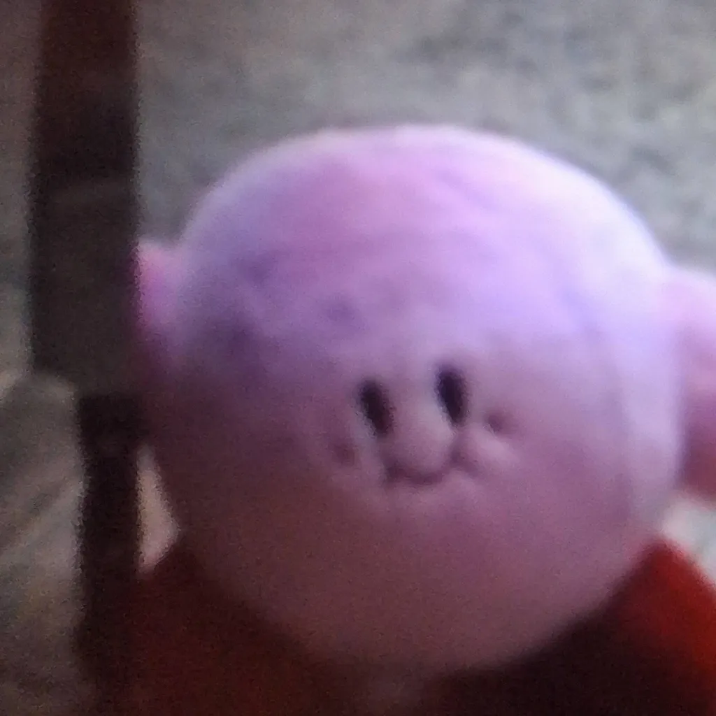 chat with ai character: Kirby with a knife