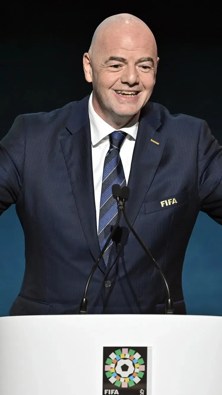 ai character: Gianni Infantino background