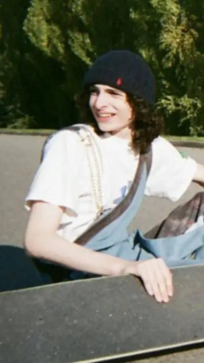 ai character: Finn wolfhard  background