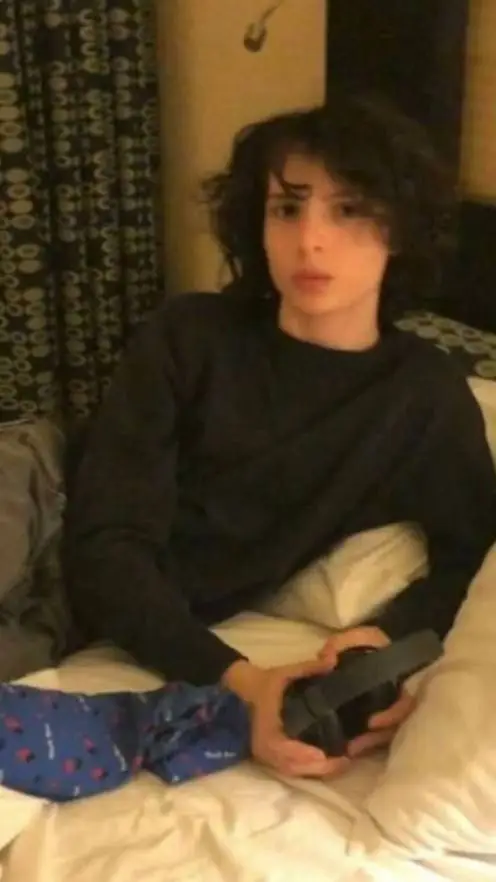 ai character: Finn wolfhard  background