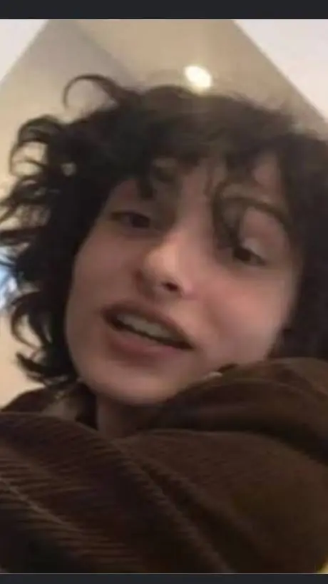 ai character: Finn wolfhard  background