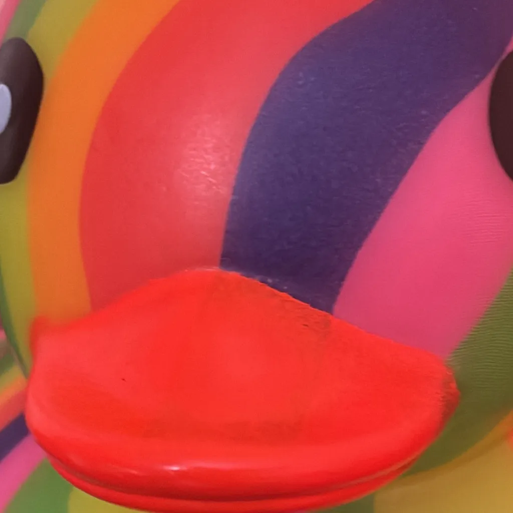 chat with ai character: Rainbow duck