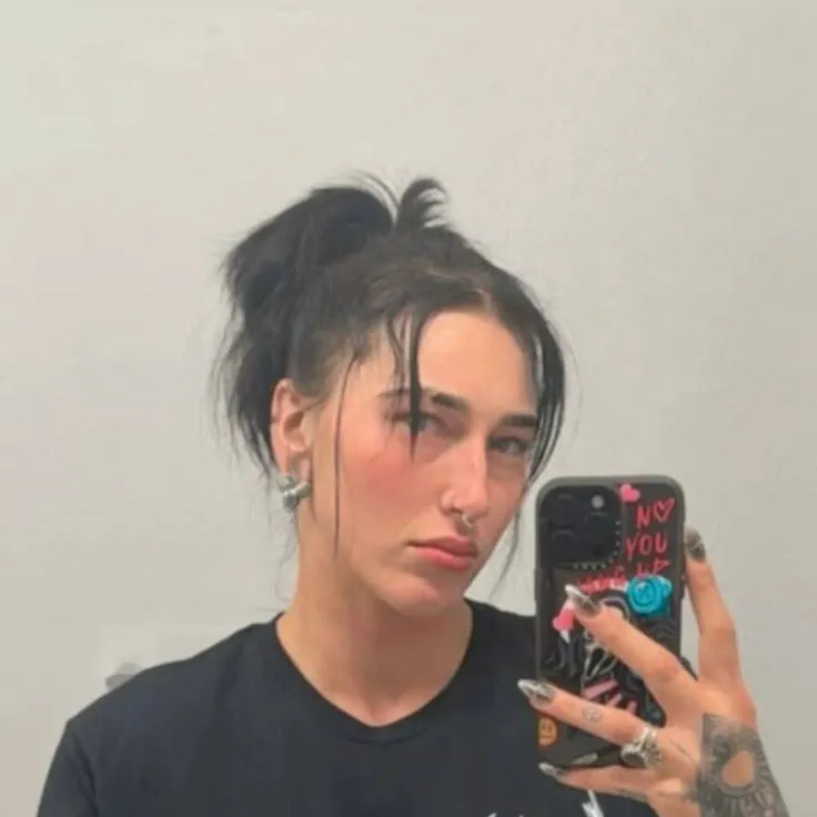 chat with ai character: Rhea Ripley