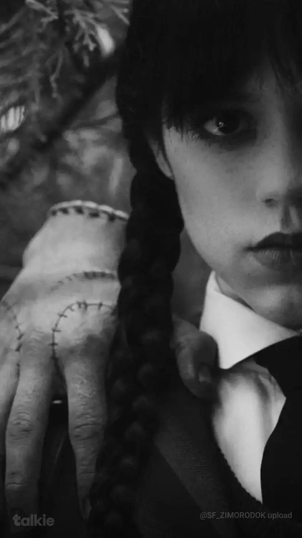 ai character: Wednesday Addams background
