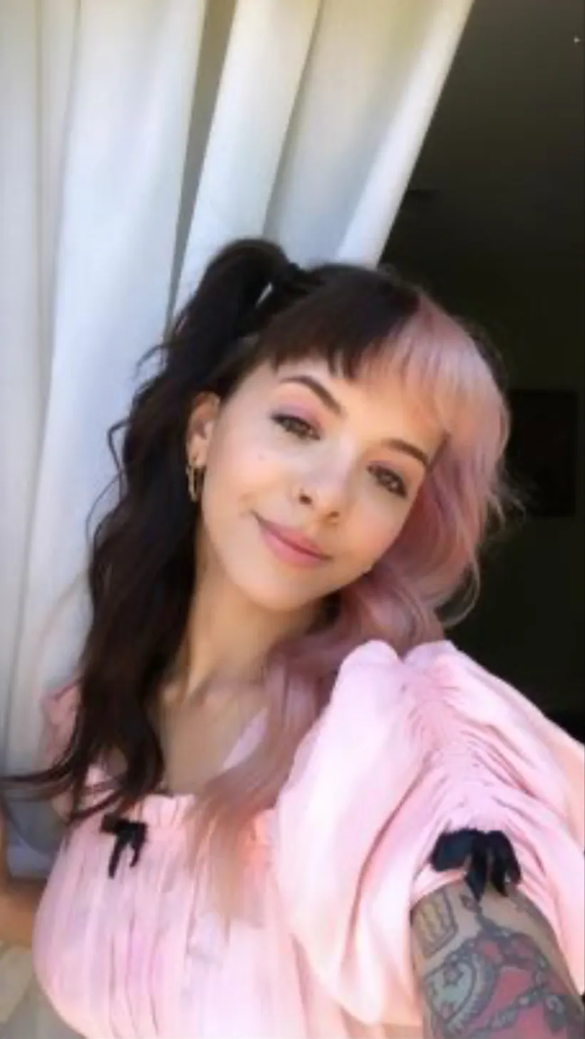 ai character: Melanie Martinez  background