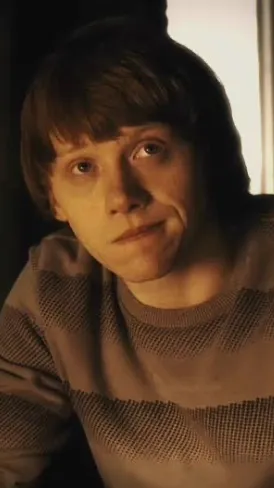 ai character: Ron Weasley ￼ background