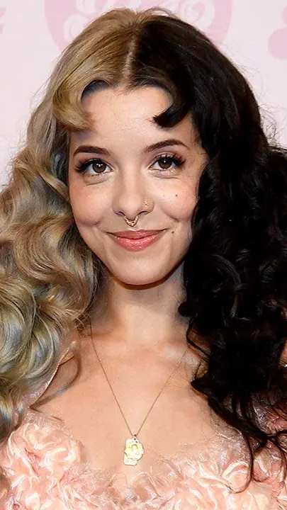 ai character: Melanie Martinez. background