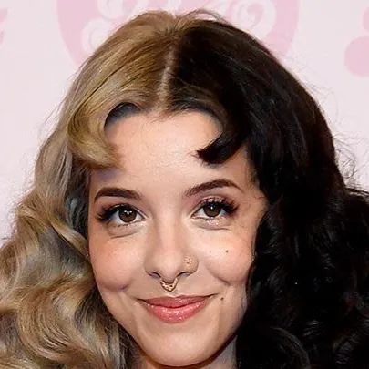 chat with ai character: Melanie Martinez.
