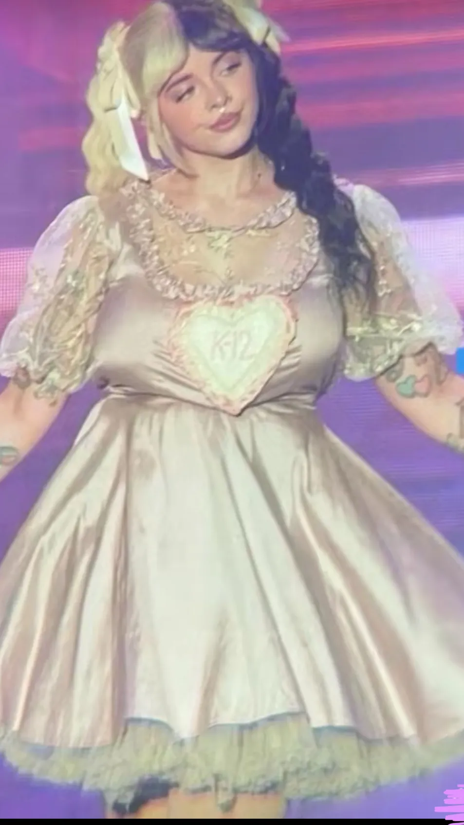 ai character: Melanie Martinez  background