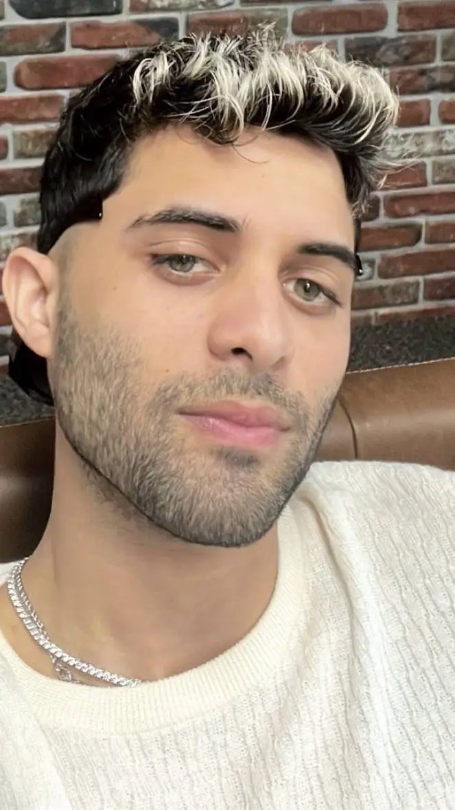 ai character: Erick Brian Colón background