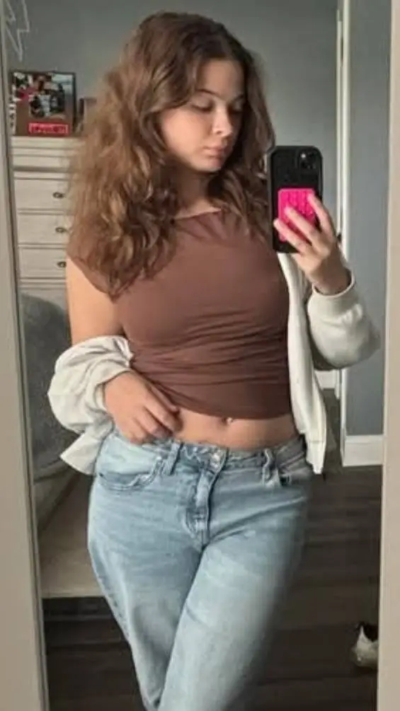 ai character: Mikayla Angelini background