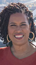 ai character: Muriel Bowser  background