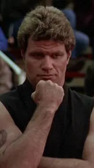 ai character: John kreese  background