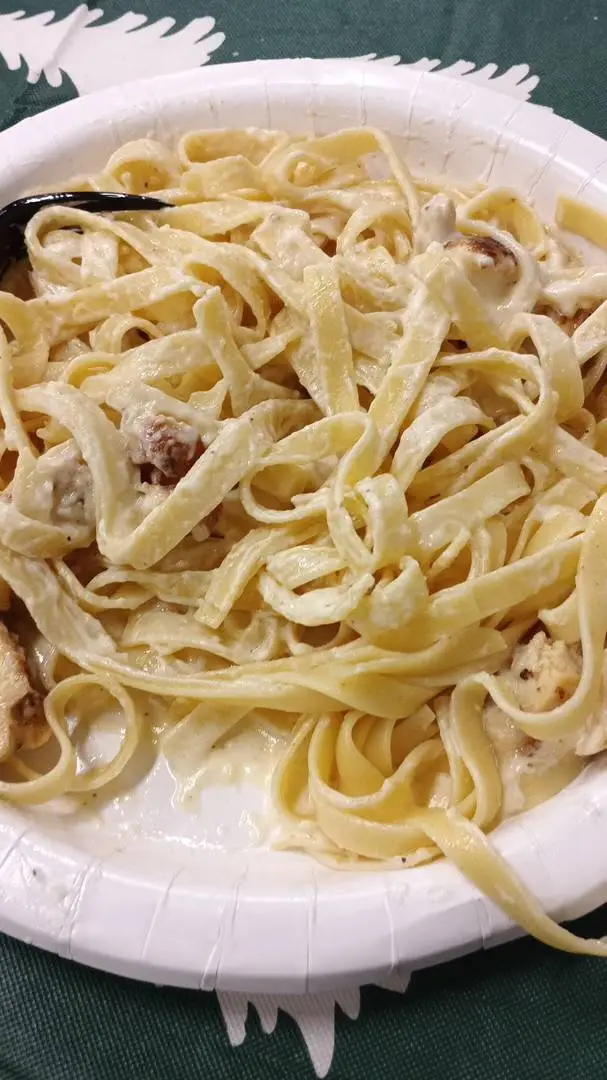 ai character: fettuccine alfredo background