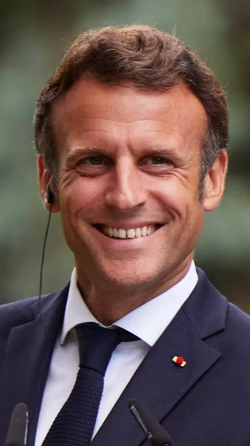 ai character: Emmanuel Macron background