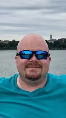 ai character: Ashton Moreau background