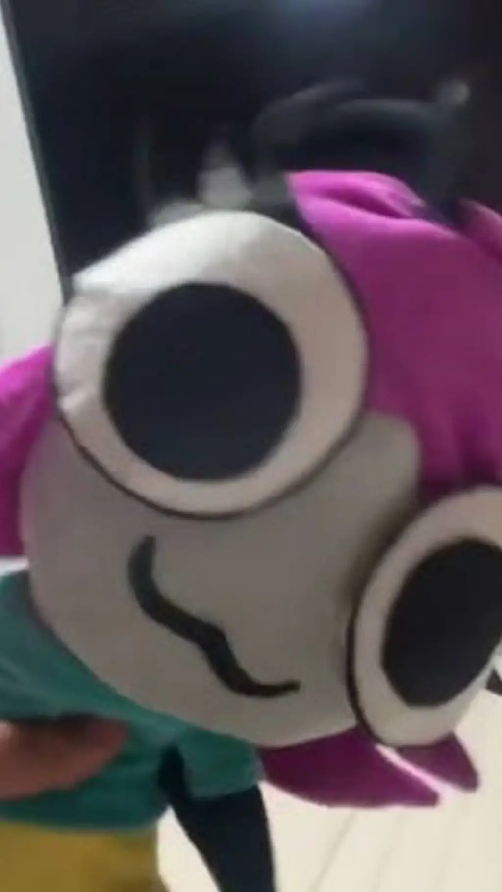 ai character: Maggie pesky plush background