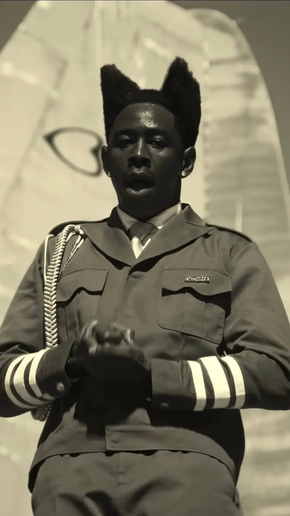 ai character: Tyler The Creator background