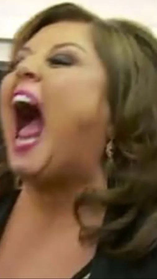 ai character: Abby Lee Miller background