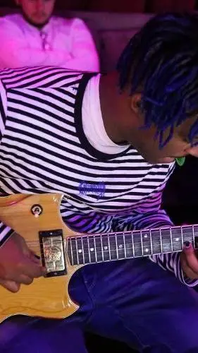 ai character: Juice wrld background