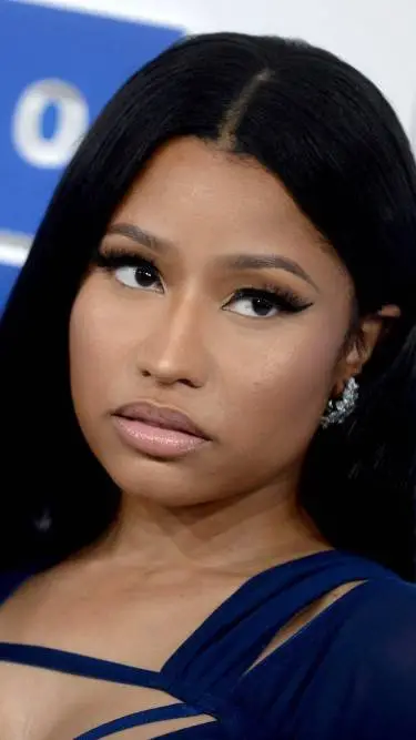 ai character: Nicki Minaj  background