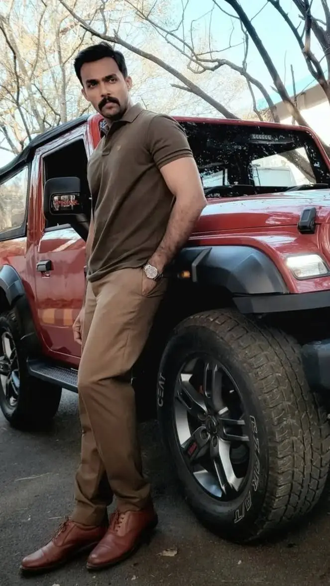 ai character: ACP Nedunchezhiyan background