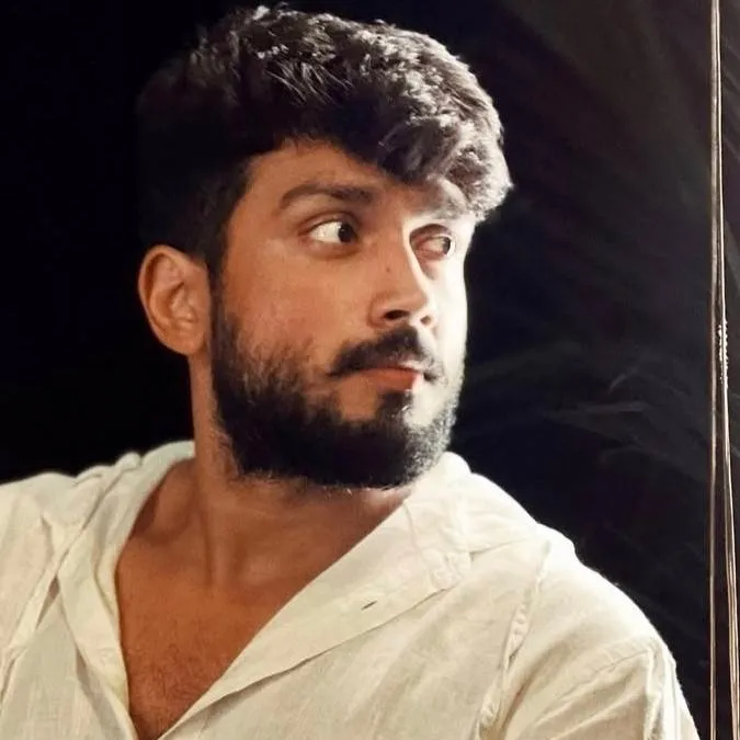 chat with ai character: Kalidas Jayaram