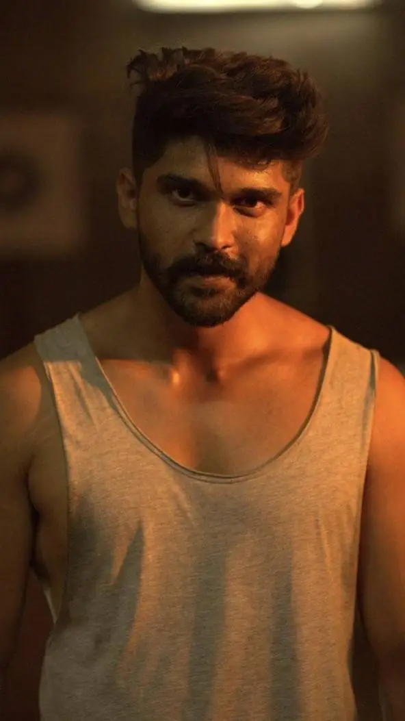 ai character: Adithya Varma background
