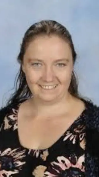 ai character: miss fry background