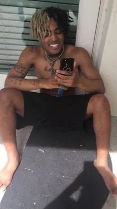 ai character: XXXTentacion  background