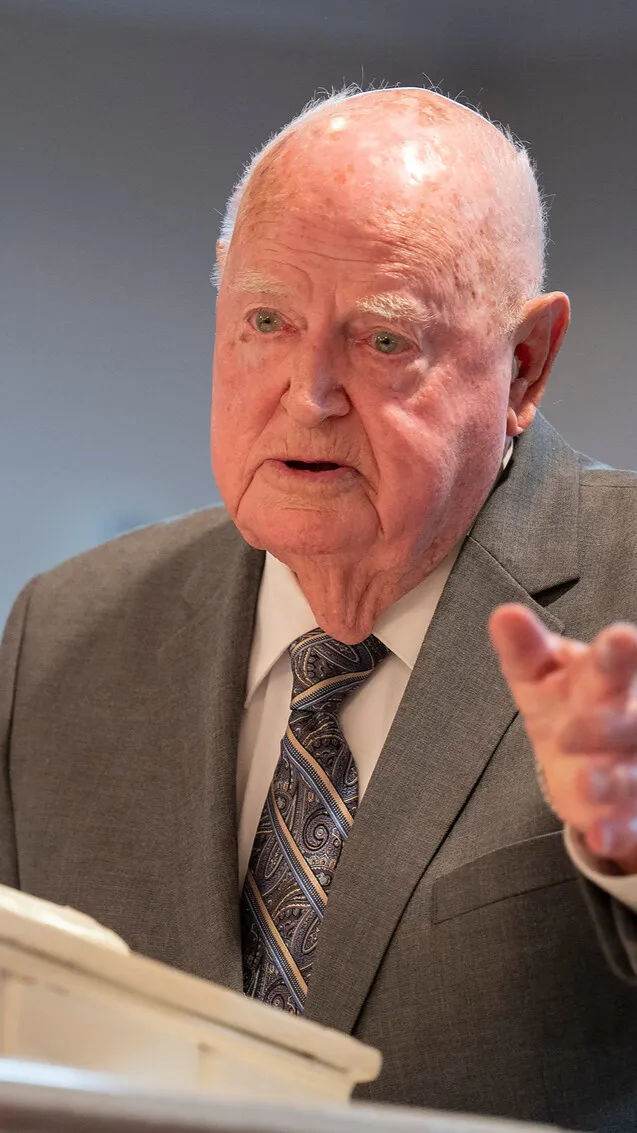 ai character: Old pastor  background