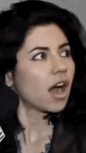 ai character: Marina Diamandis  background