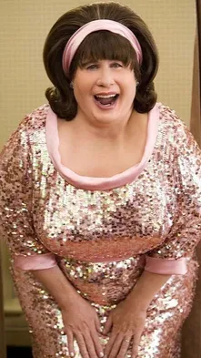 ai character: Edna Turnblad  background