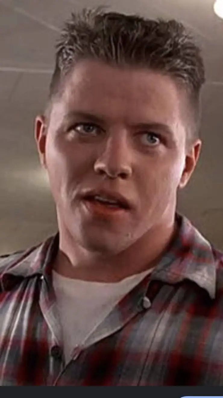 ai character: biff tannen  background