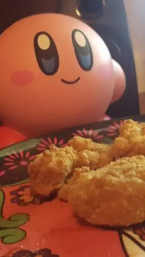 ai character: kirby w/ nuggies background
