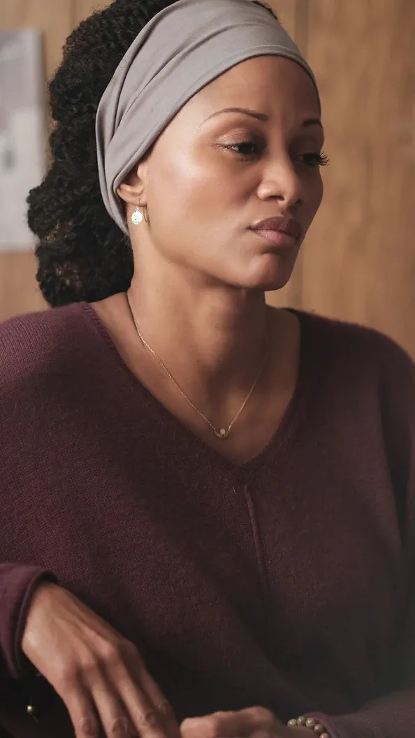 ai character: Rues Mom 👩🏾  background