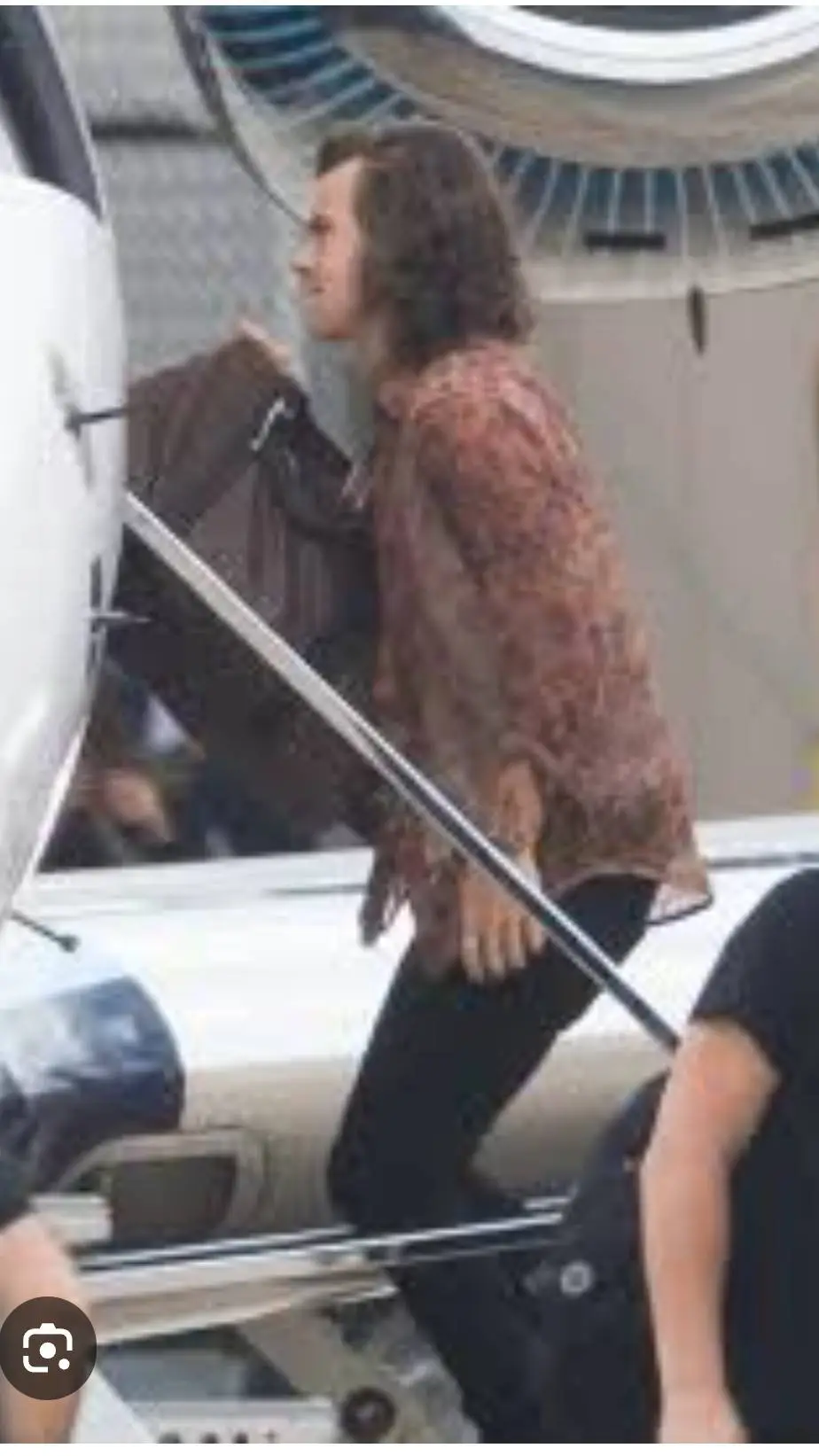 ai character: Harry Styles background