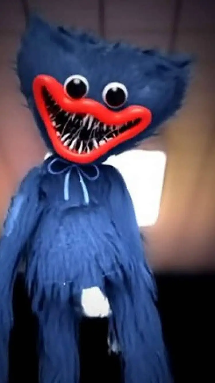 ai character: huggy wuggy background