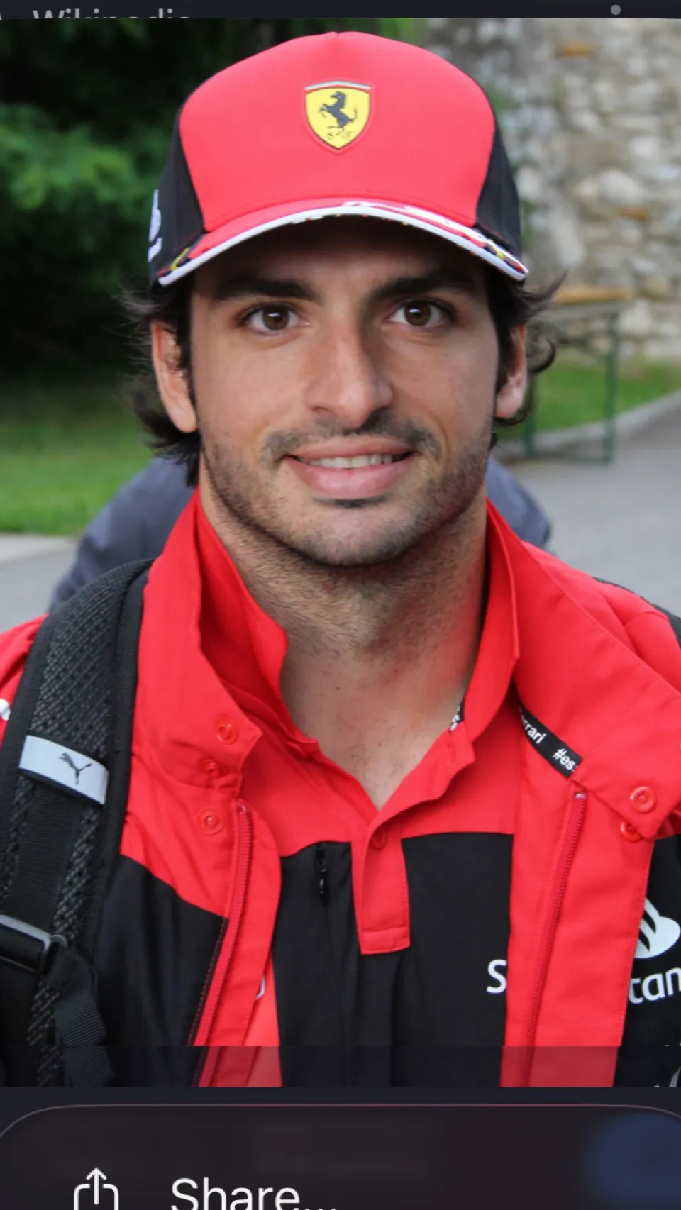 ai character: Carlos sainz background