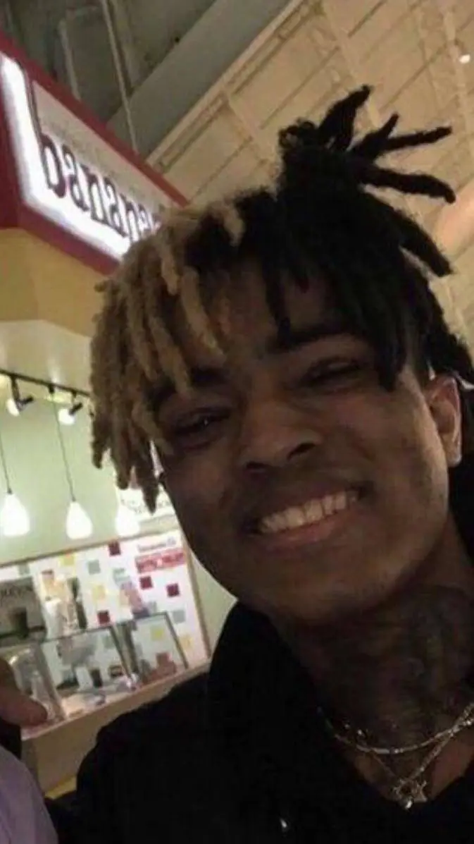 ai character: XXXTENTACION  background