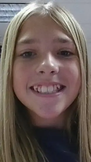 ai character: Lillie Clark  background