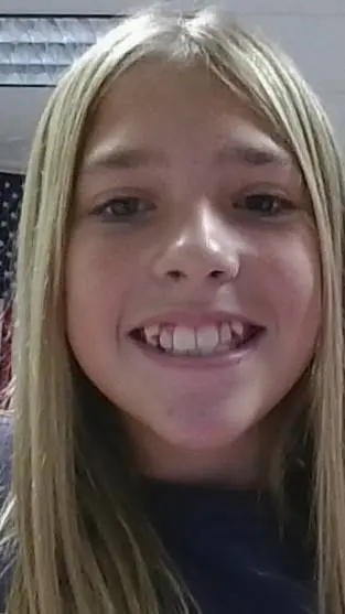 ai character: Lillie Clark  background