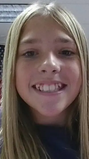 ai character: Lillie Clark  background